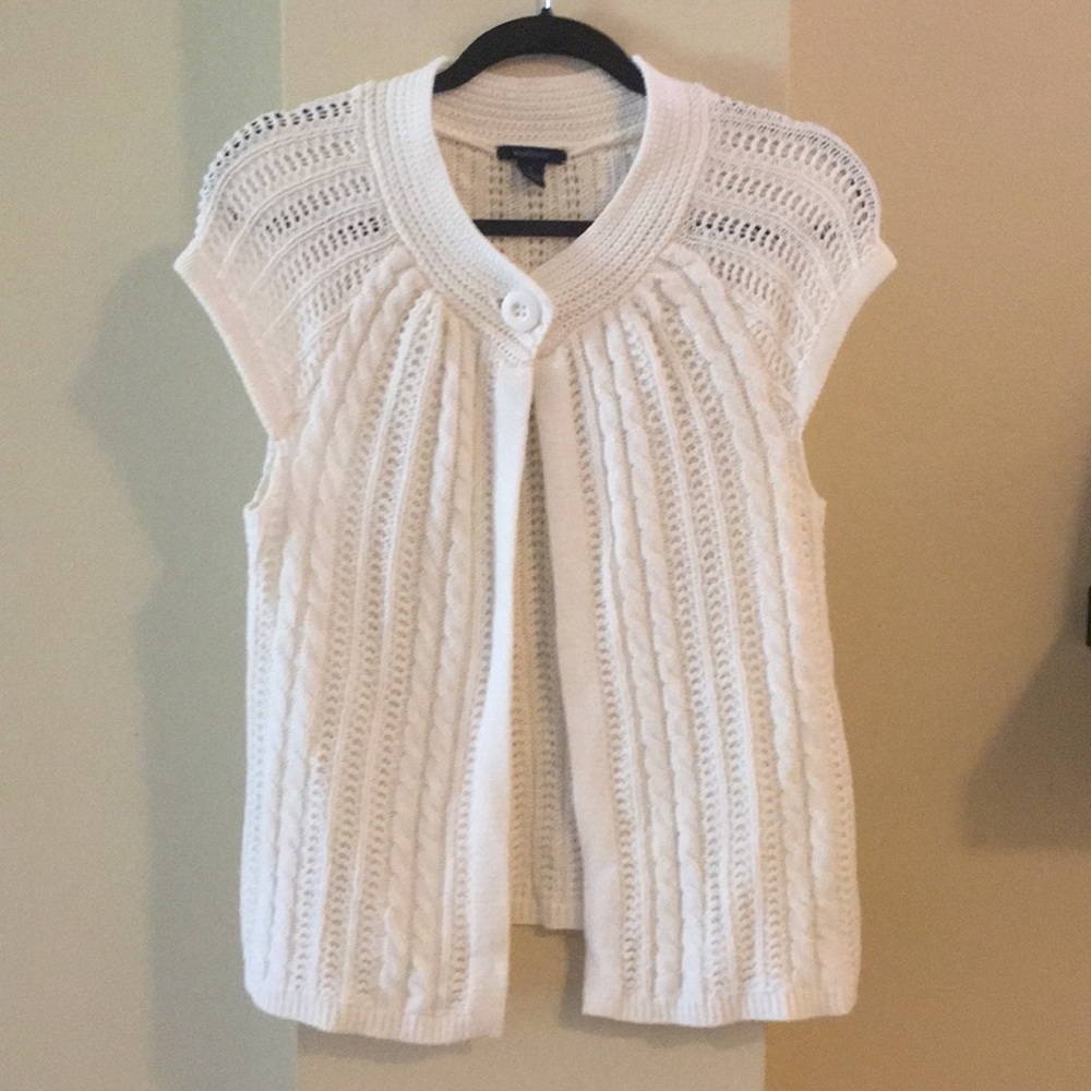 Cream cable knit sweater.
